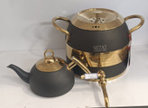 کتری قوری نزاز مدل کد 2605 با طراحی لوکس مشکی طلایی، مناسب برای دمکردن چای و دمنوش، ساختهشده از استیل ضدزنگ با دستههای مقاوم، انتخابی شیک برای آشپزخانههای مدرن